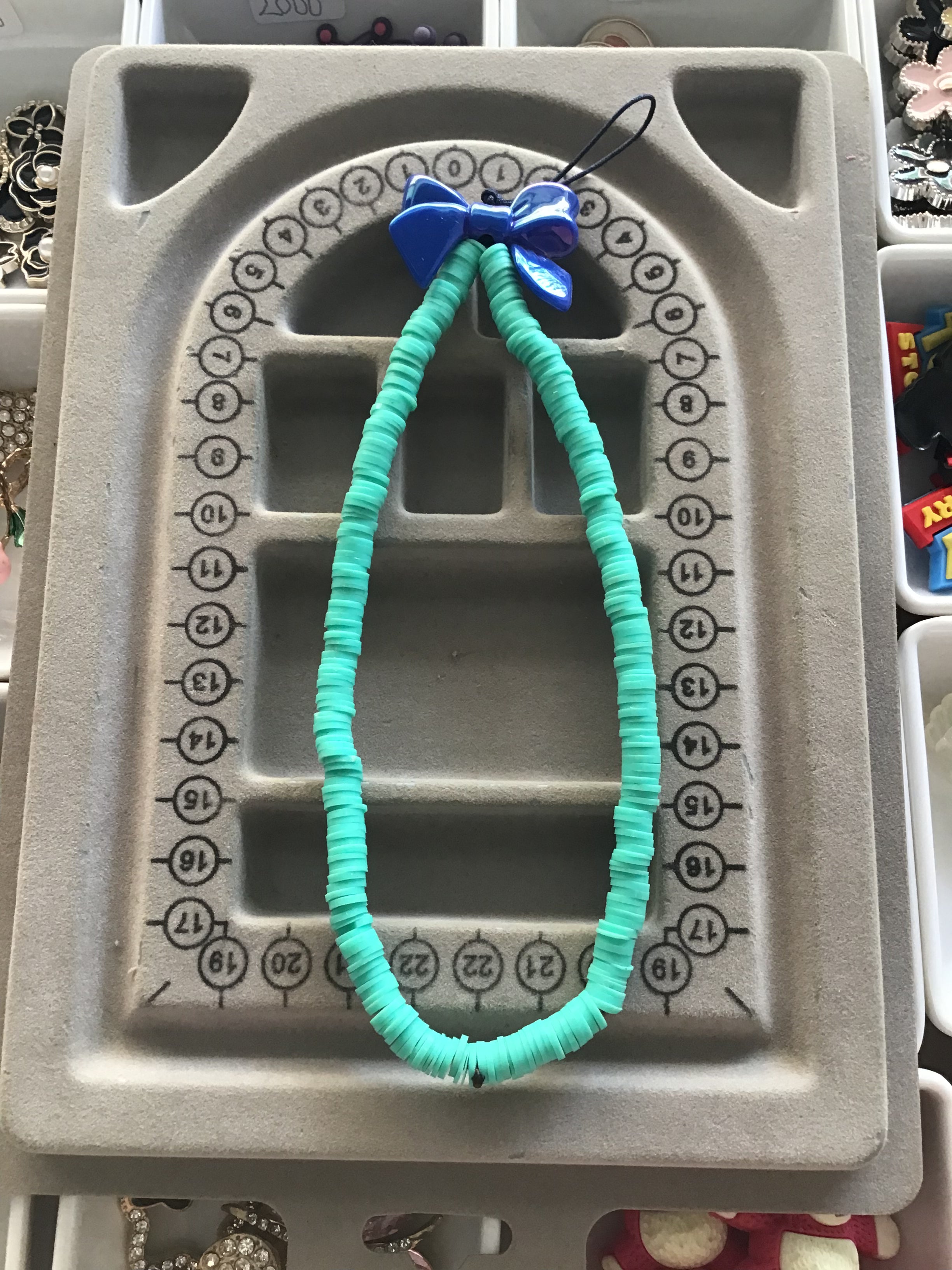 Sea green with blue bow phone charm