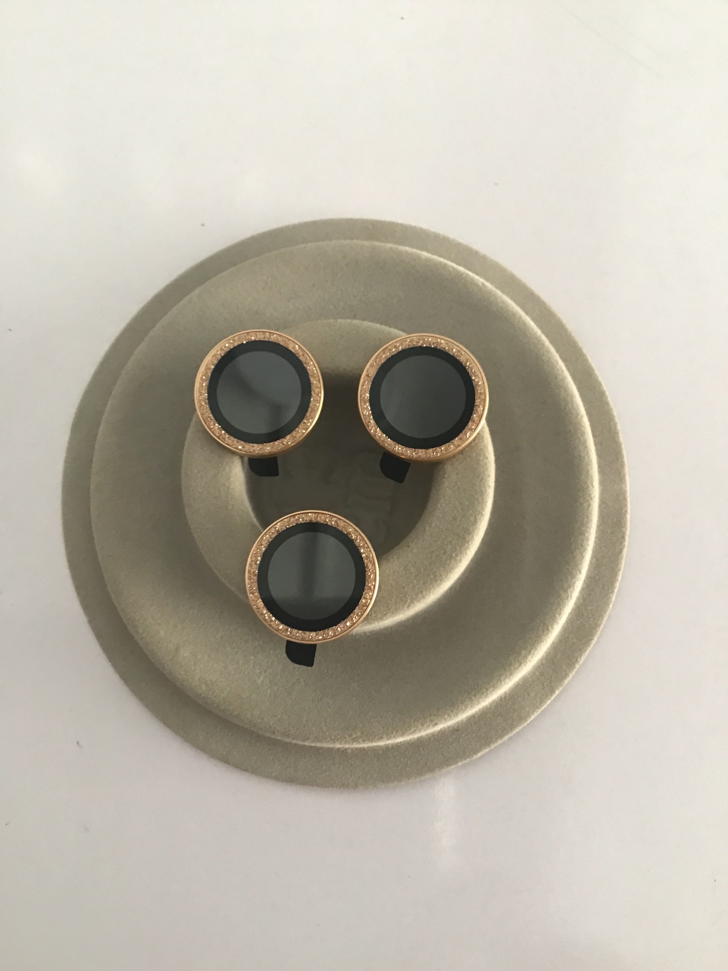 Shiny gold camera lens